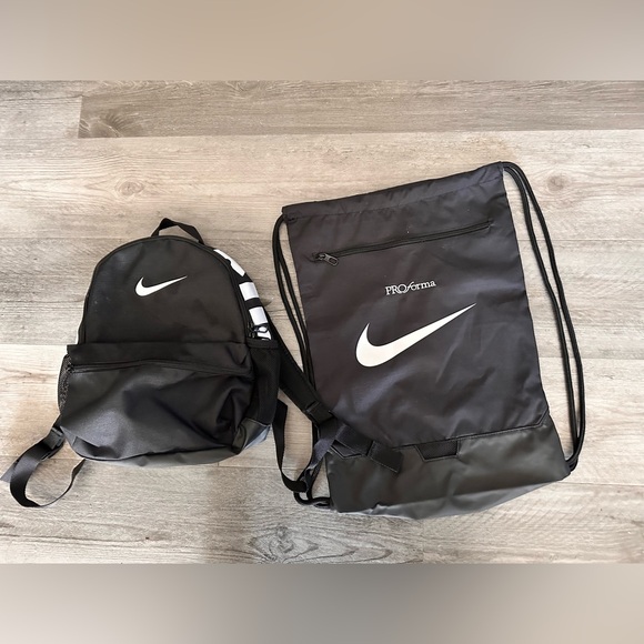 Nike Handbags - 2 New Nike Bags! One backpack One Drawstring NWOT